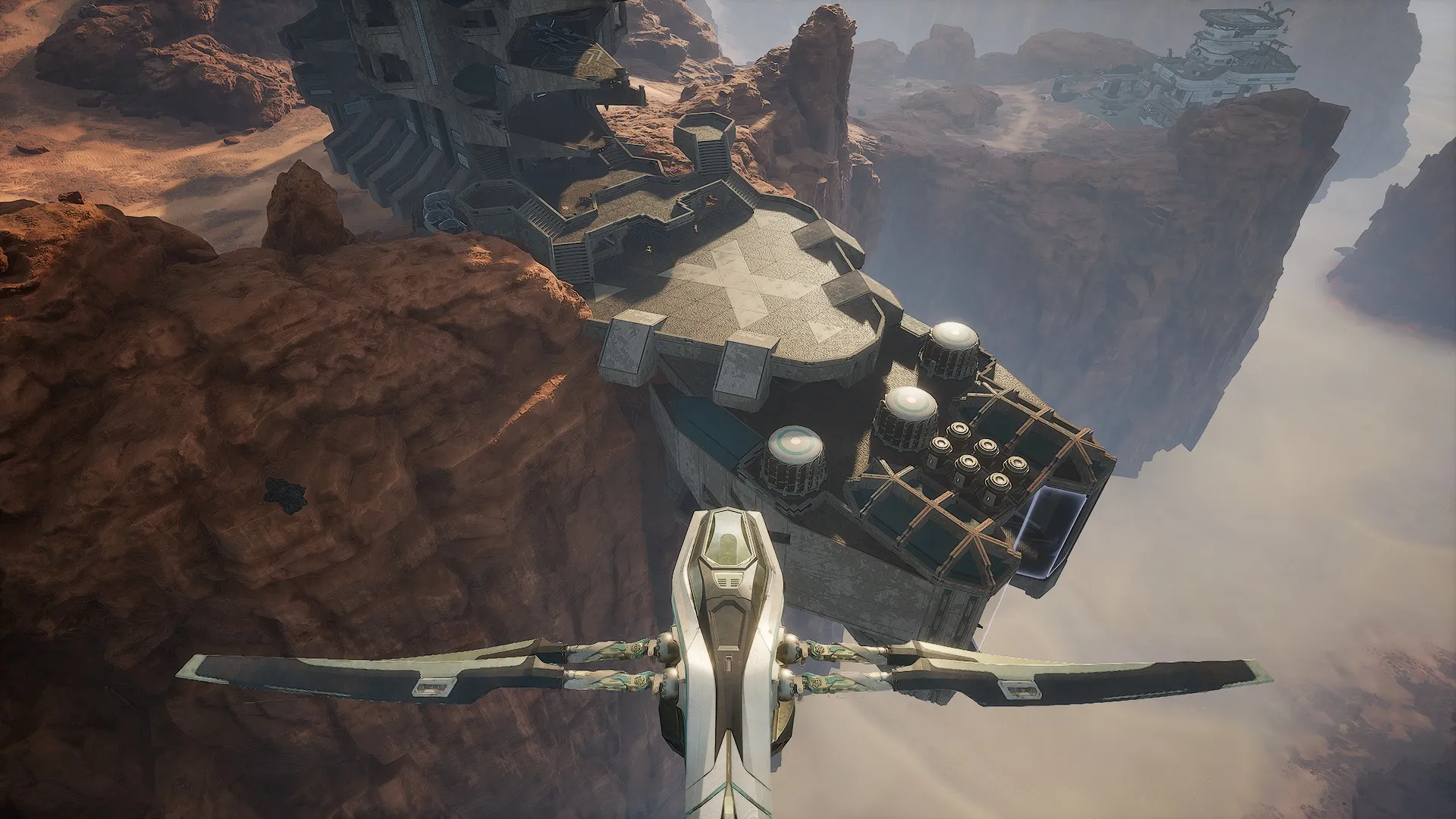 Top-down approach showing staging areas and elevated pads